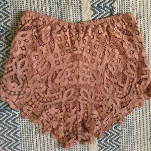 Free People “Adella” pink lace stretchy shorts